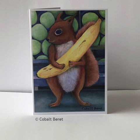 Recycled Greeting Card of a squirrel holding a banana.  About the loss of wildlife habitat